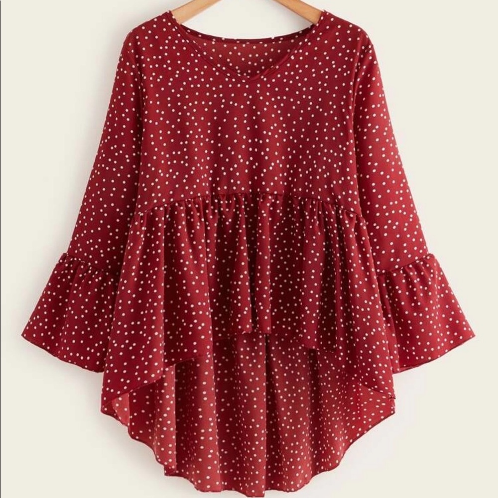 Polka dot dip hem babydoll blouse